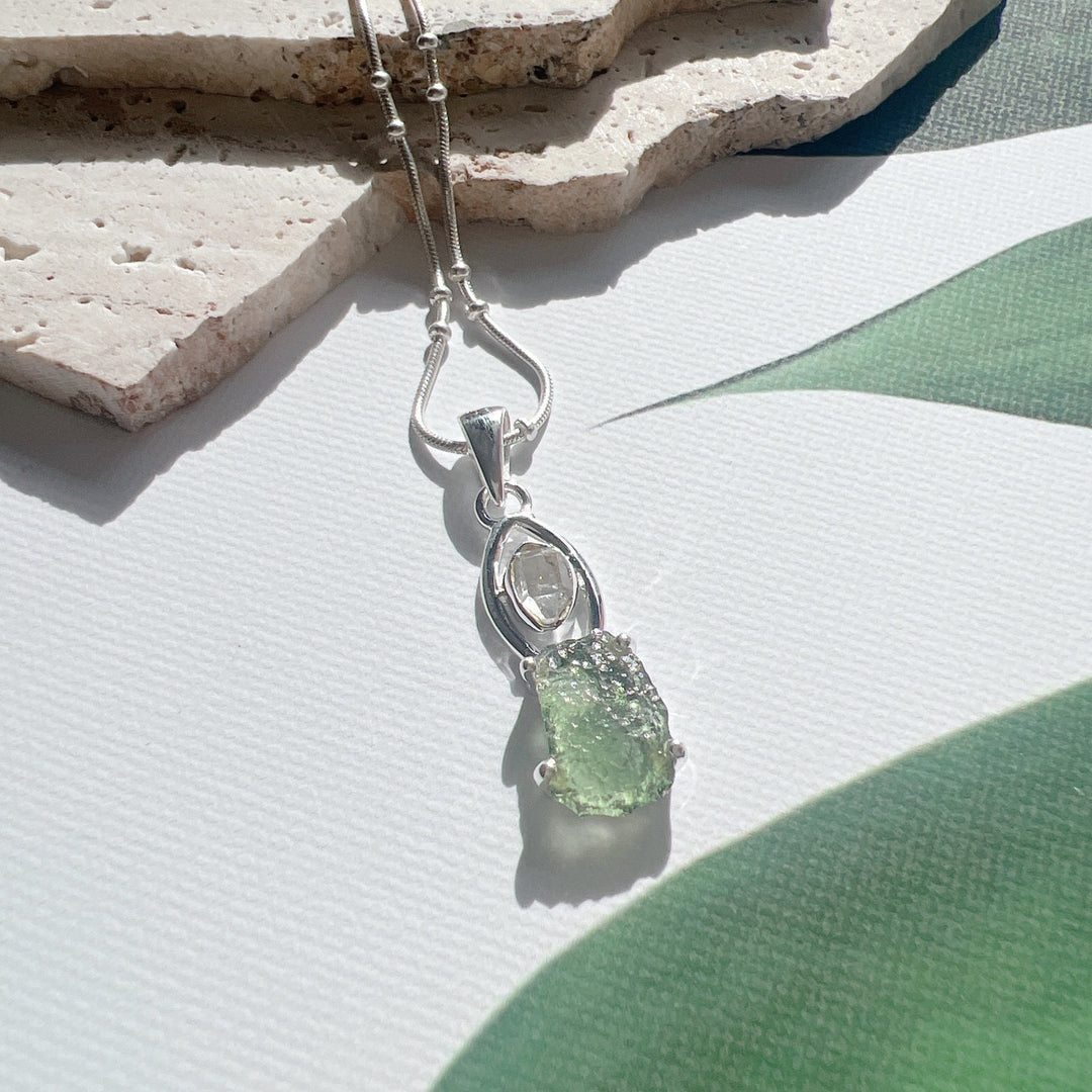 MOLDAVITE & HERKEMIER DIAMOND PENDANT