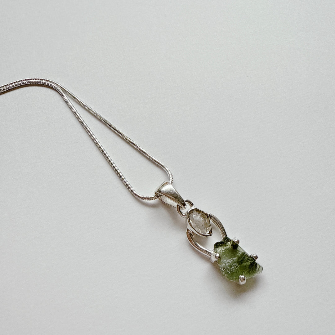 MOLDAVITE & HERKEMIER DIAMOND PENDANT