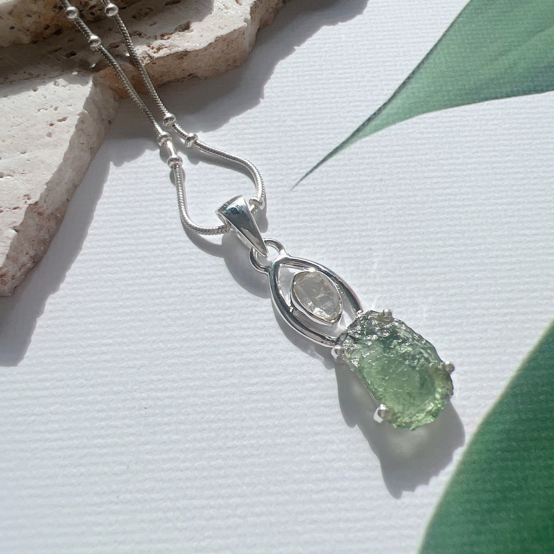 MOLDAVITE & HERKEMIER DIAMOND PENDANT