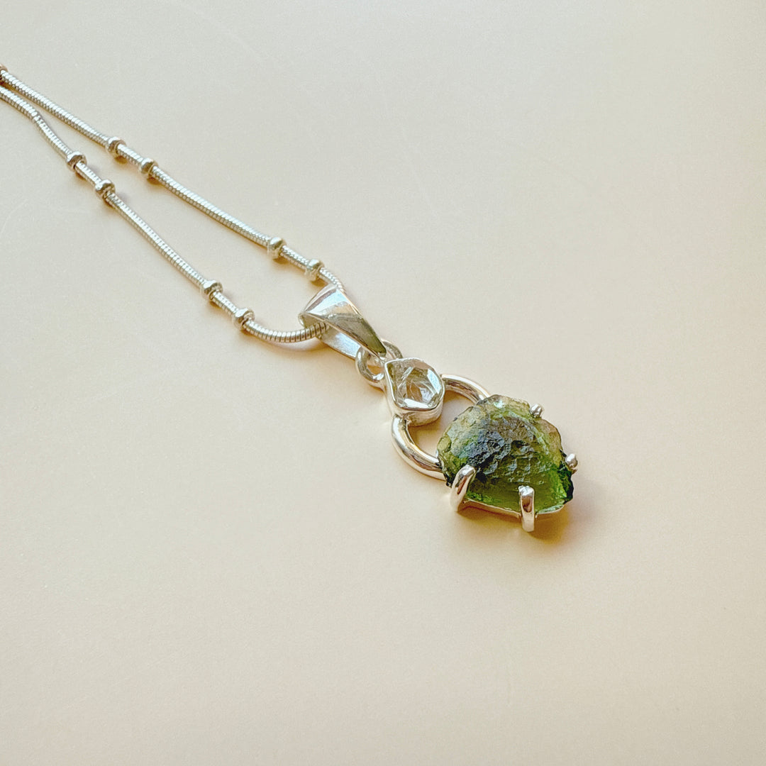 MOLDAVITE & HERKEMIER DIAMOND PENDANT