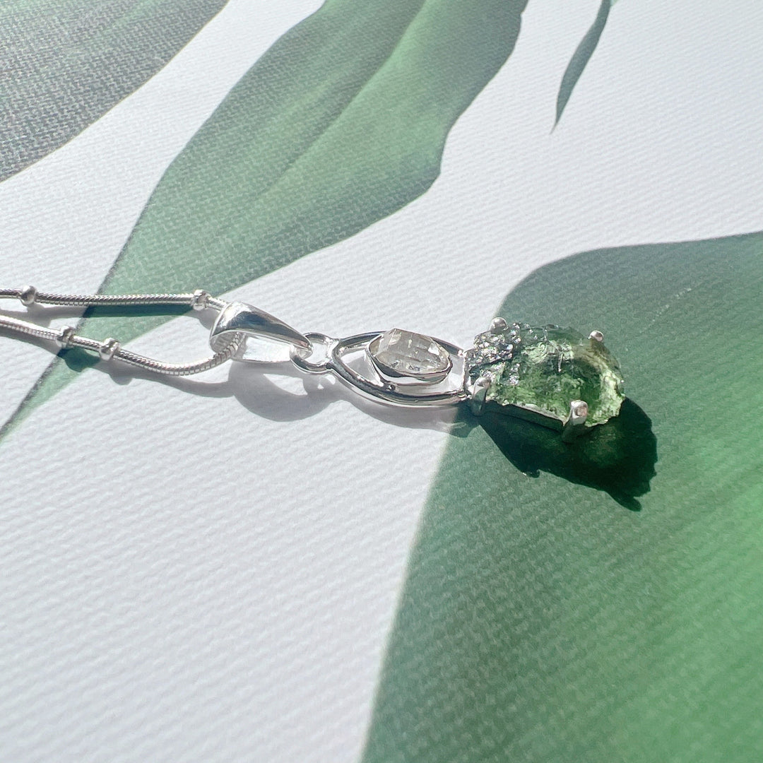 MOLDAVITE & HERKEMIER DIAMOND PENDANT