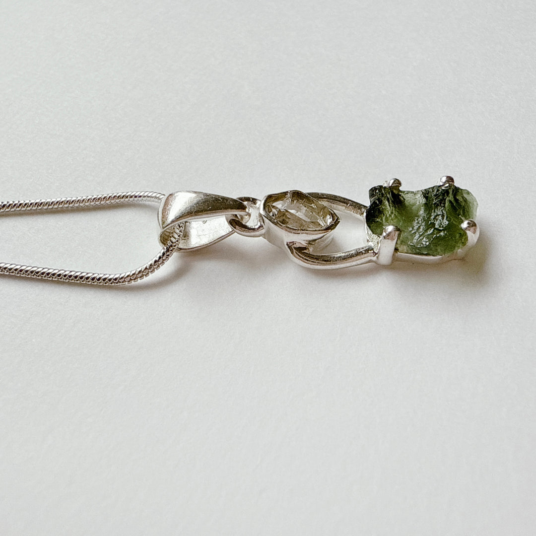 MOLDAVITE & HERKEMIER DIAMOND PENDANT