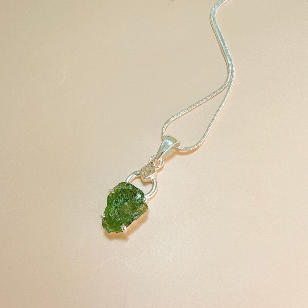 MOLDAVITE & HERKEMIER DIAMOND PENDANT