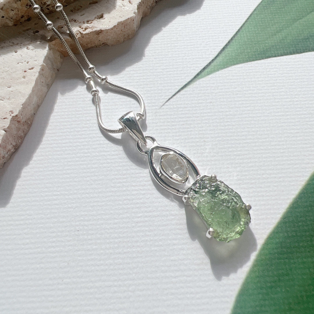 MOLDAVITE & HERKEMIER DIAMOND PENDANT