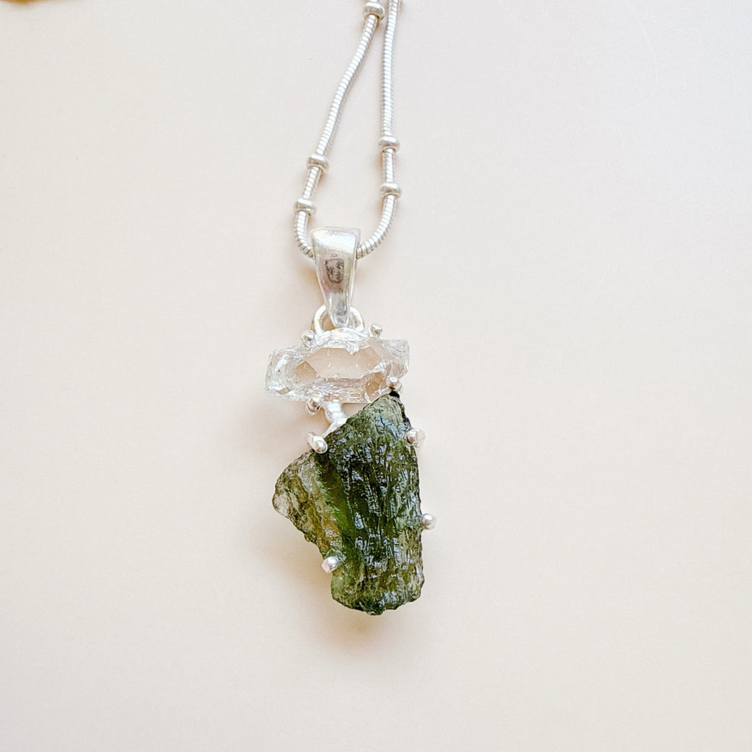 MOLDAVITE & HERKEMIER DIAMOND PENDANT