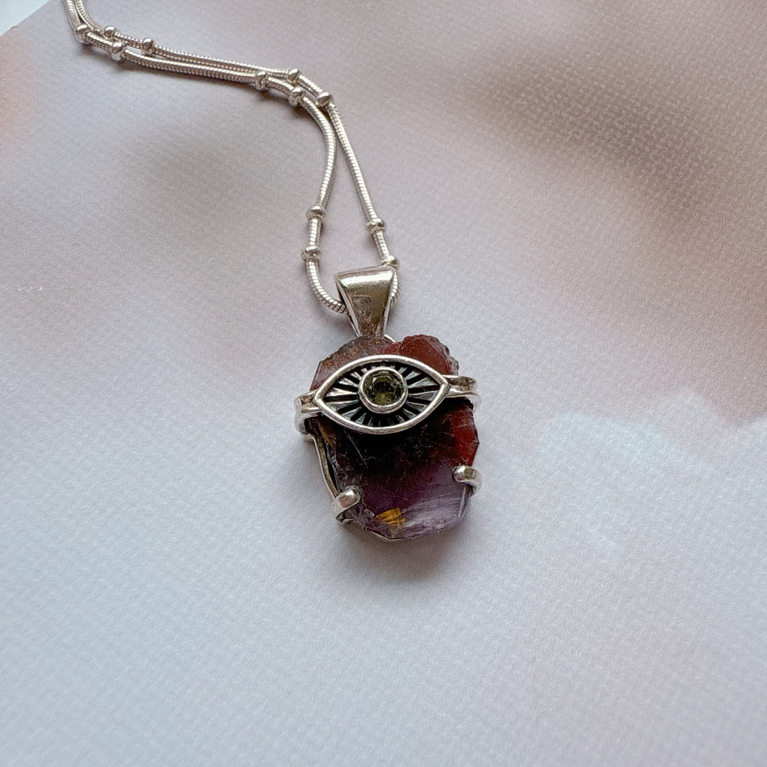 Evil Eye Pendant with Moldavite & Caxonete