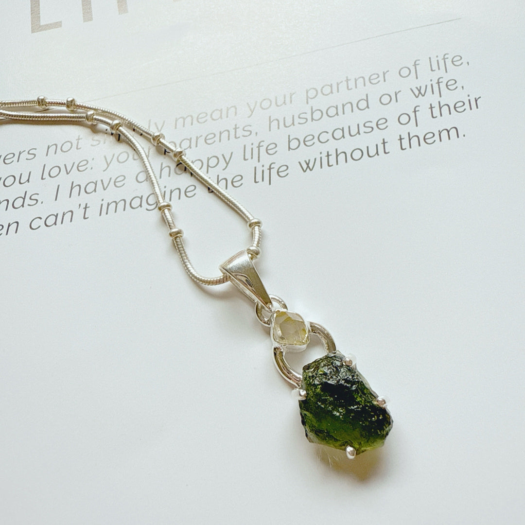 MOLDAVITE & HERKEMIER DIAMOND PENDANT