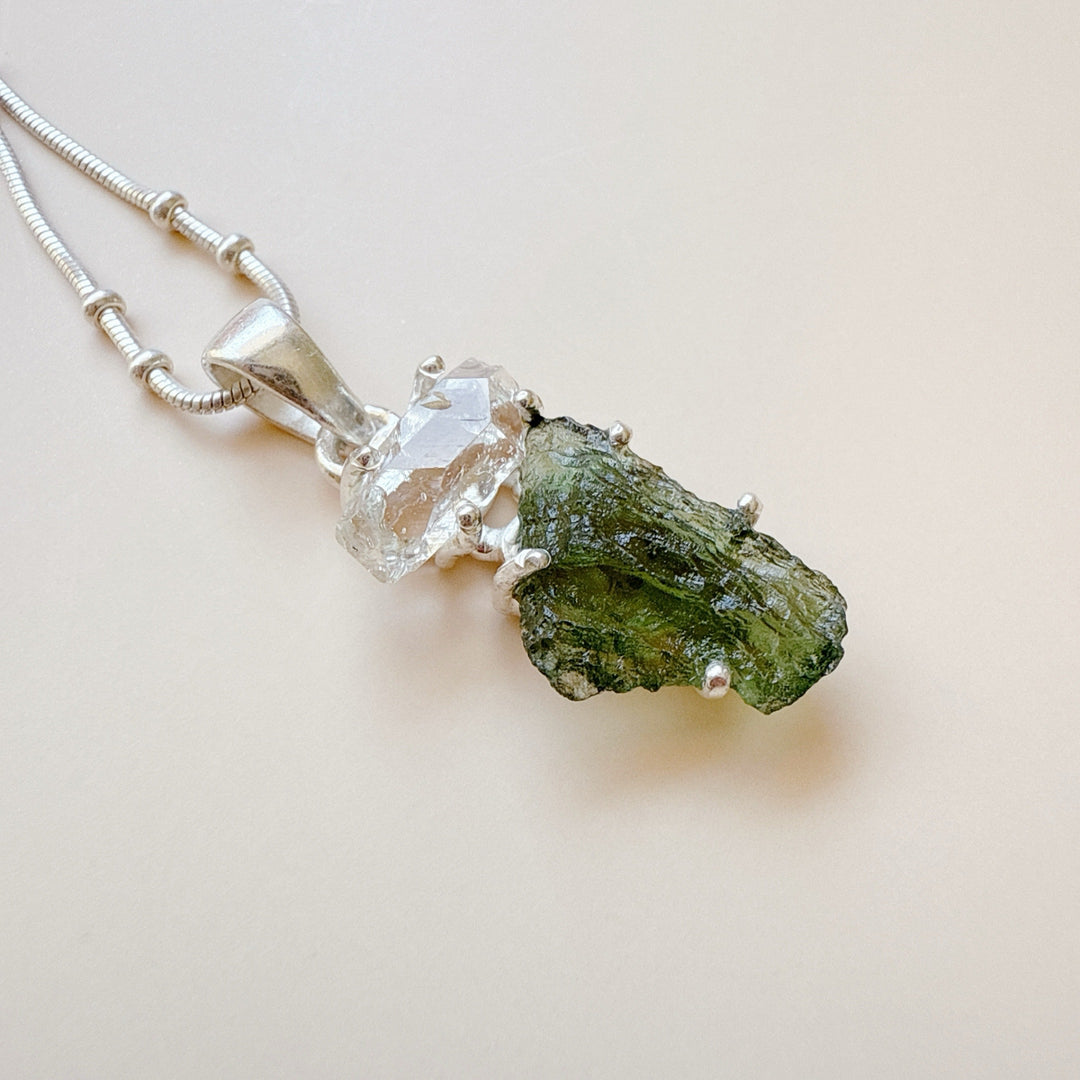 MOLDAVITE & HERKEMIER DIAMOND PENDANT