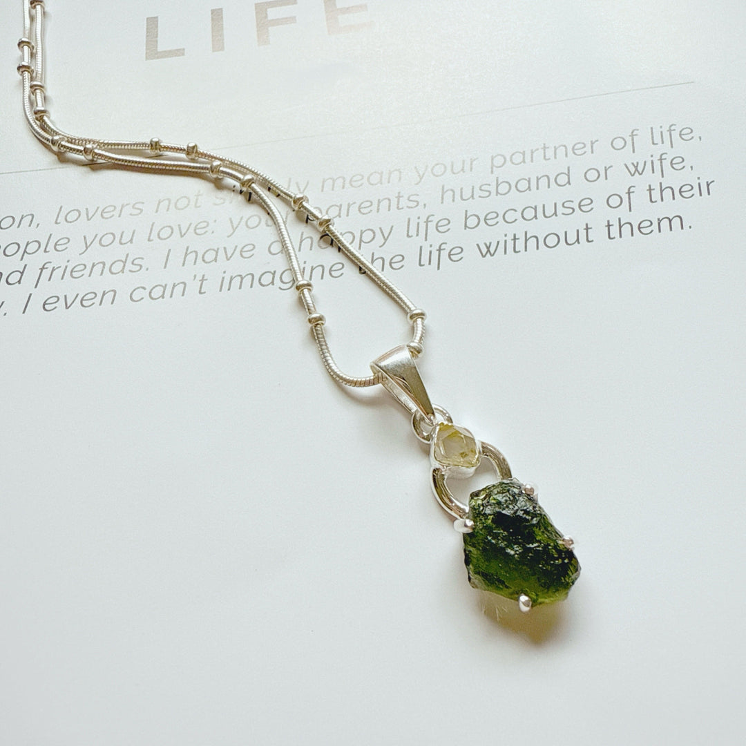 MOLDAVITE & HERKEMIER DIAMOND PENDANT