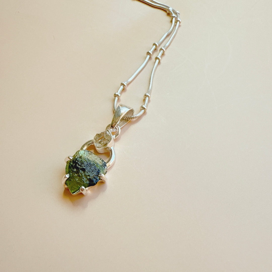 MOLDAVITE & HERKEMIER DIAMOND PENDANT