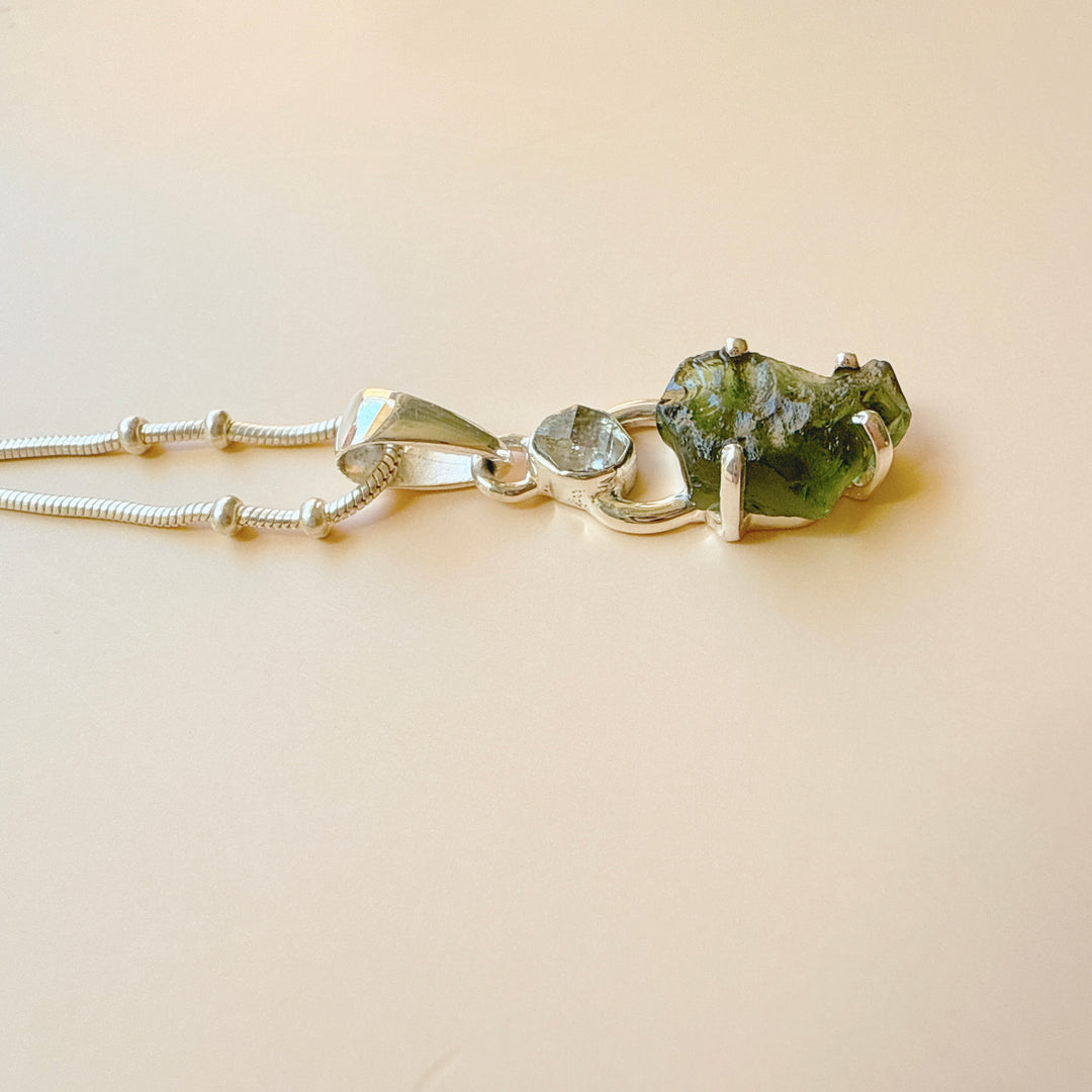 MOLDAVITE & HERKEMIER DIAMOND PENDANT