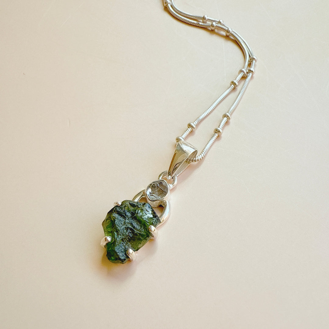 MOLDAVITE & HERKEMIER DIAMOND PENDANT