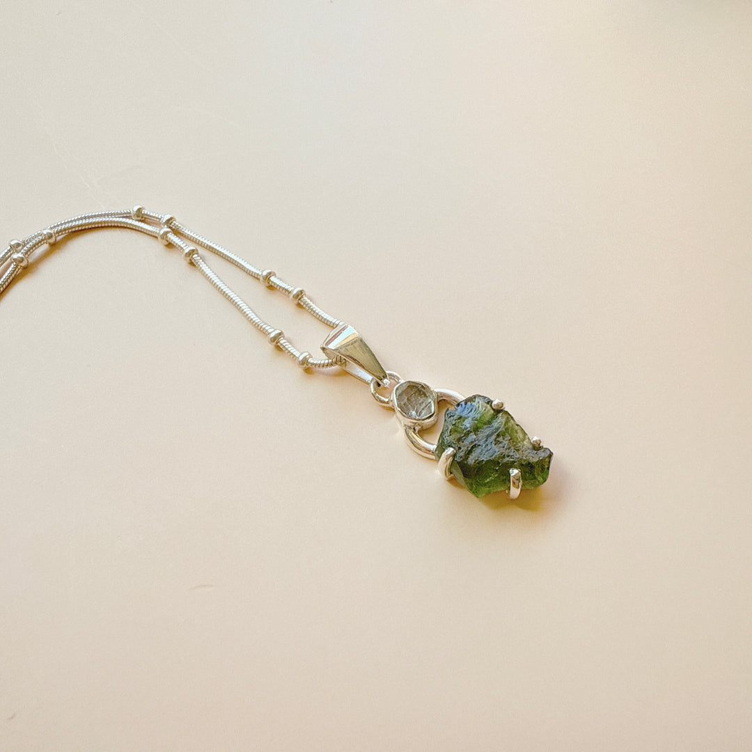 MOLDAVITE & HERKEMIER DIAMOND PENDANT